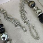 Silver and Black Charm Necklace Mixed Media Photo 6