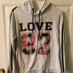 On Fire  white graphic love sweatshirt size large Photo 0