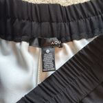 AQUA Black and White Scalloped Elastic Shorts Photo 7