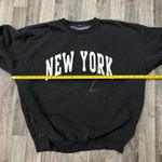Brandy Melville John Galt faded black New York Sweatshirt Photo 2
