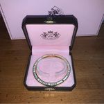 Juicy Couture Retro  Pam & Gela White & Gold Bangle Bracelet Photo 1