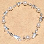Sterling Silver Faux Pearl and Star Bracelet Photo 0