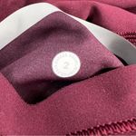 Lululemon (Like New) In Movement Tight 25" *Everlux in Garnet, Size 2 Photo 7