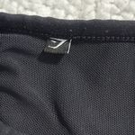 Gymshark  non stop sports bra black size medium size pocket zips front clasps bck Photo 3