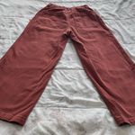 Universal Threads Universal Thread rust brown high waisted wide leg Cropped jeans, size 0/25” Photo 15