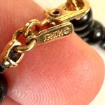 Monet black and gold tone bracelet Photo 8