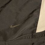 Nike  womens dri fit black and white running shorts size S Photo 2