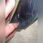 Coach NWT Signature Leather Corner Zip Wristlet. Photo 7