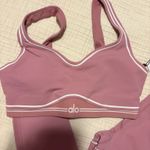 Alo Yoga Alo Airbrush Heart Throb Bra and Airbrush High-Waist Heart Throb Legging Photo 1