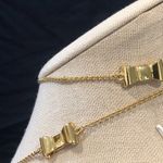 Kate Spade  Gold Tone Gold Enamel Bow Long Necklace Photo 12