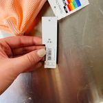 No Boundaries Peach Swim Top Photo 2