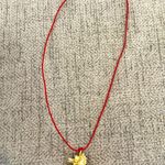 Small Gold plated Dragon Pendant Necklace with Red Cord Photo 3