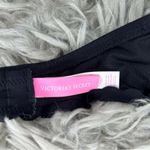 Victoria's Secret Victoria’s Secret The Getaway Halter black bikini swim top women’s size 32DD Photo 6