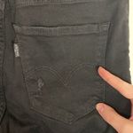 Levi's Levi’s 721 solid black distressed high rise skinny jeans size 27 Photo 11