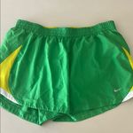 Nike  Women’s Size Large Green and Yellow Lightweight Performance Shorts Photo 0