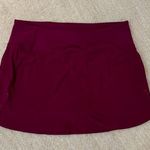 Athleta running skort cranberry color size medium Photo 0