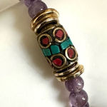Amethyst stretchy charm bracelet with Indian beads Photo 0