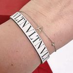 Valentino Garavani Authentic White & Black Thin Leather VLTN Buckle Bracelet Photo 1