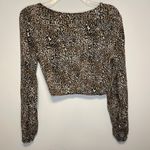 Urban Outfitters  | Cheetah Twist Front Crop Top Photo 4