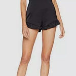 Bebe Ruffle Hem V-Neck Short Sleeve Stretch Satin Romper Jet Black Size 4 Photo 0