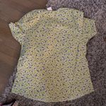 Yellow flowery scrub top Size M Photo 1
