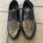 Dr. Martens  Arien 3 Eye Creeper leopard print cat print size 7
Rockabilly Photo 1