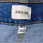 Sneak peek light wash ripped jeans Size 25 Photo 3