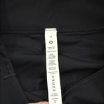 Lululemon  High-Rise Black Leggings with Side Pockets Size 12 Performance Pants Photo 1