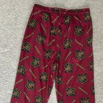Harry Potter  Hogwarts Lounge Pants, maroon, size small Photo 1