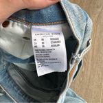 American Eagle  90’s Straight Leg Distressed Light Wash Jeans Photo 3