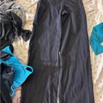 Aritzia  tna tn action straight leg flare black leggings Photo 1