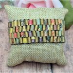 Holly Anne Mitchell jewelry Handmade Gold Tone & Newspaper Bead Stretch Bracelet Photo 1