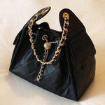 Black quilted faux leather shoulder bag purse with gold chain & gold accents Photo 0