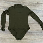MANGOPOP NWOT  collection green turtle neck body suit. Incredibly comfy material Photo 0
