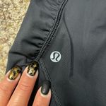 Lululemon  Water Bound Crops Black and Blue Tropics Size 4 Photo 9