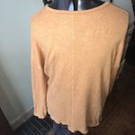 American Eagle  Soft and Sexy plush raw hem mustard yellow high low tee Photo 1