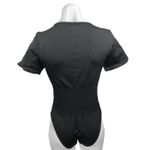 OQQ Black Ribbed Crewneck Short Sleeve Stretch Bodysuit T Photo 1