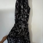 White House | Black Market Black and white floral romper with adjustable belt  #floralromper Worn once to try on. Photo 0