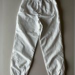 Nike NWOT Women’s Icon Clash Jogger Pants Heather Grey White Size Small Photo 5