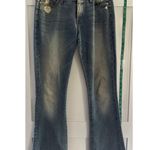 7 For All Mankind  Jiselle Wide Leg Loose Fit Distressed Blue Jeans Size 27 Photo 0