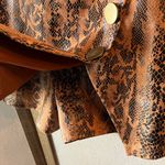 Haute Monde  Black and Orange Patterned pleather skort small Photo 5