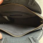 Free People  Round Vegan Leather Crossbody Bag in Black Photo 3