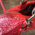 Jessica Simpson Red Shoulder Bag with Textured Leather and Modern Zipper Design Photo 3