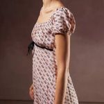 Motel Rocks MOTEL Savio Mini Dress In Cherry Pink Bow Print Photo 2