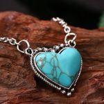 Cute cowgirl/western style silver chain with cute turquoise heart center… Photo 1