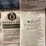 Levi's Levi’s Premium Women’s 501 Distressed Raw Hem Light Wash Button-Fly Denim Shorts Photo 8