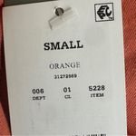 The Rolling Stones NWT Graphic T-Shirt Womens S Orange Cropped Band Tee Daisy Floral Photo 3