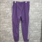 Adidas Women's Purple Joggers with White Stripes Photo 2