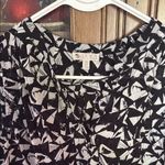 Lila Rose Black and White Sleeveless Top Photo 3