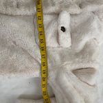 Cream and white faux fur bomber jacket zip up and button long sleeve Size M Photo 3
